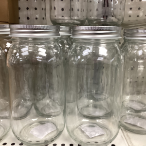 Glass Jars With Silver Lids.